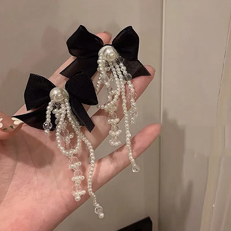 

Retro High Quality Temperament Hepburn Style Bow Pearl Tassel Earrings Female S925 Silver Needle Earrings for Women 2020