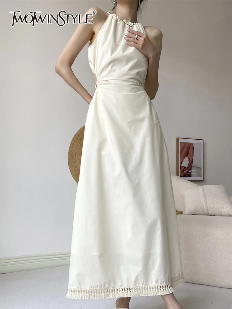 

TWOTWINSTYLE Solid Spliced Tassel Dresses For Women Halter Sleeveless High Waist Casual Temperament Long Dress Female Clothing