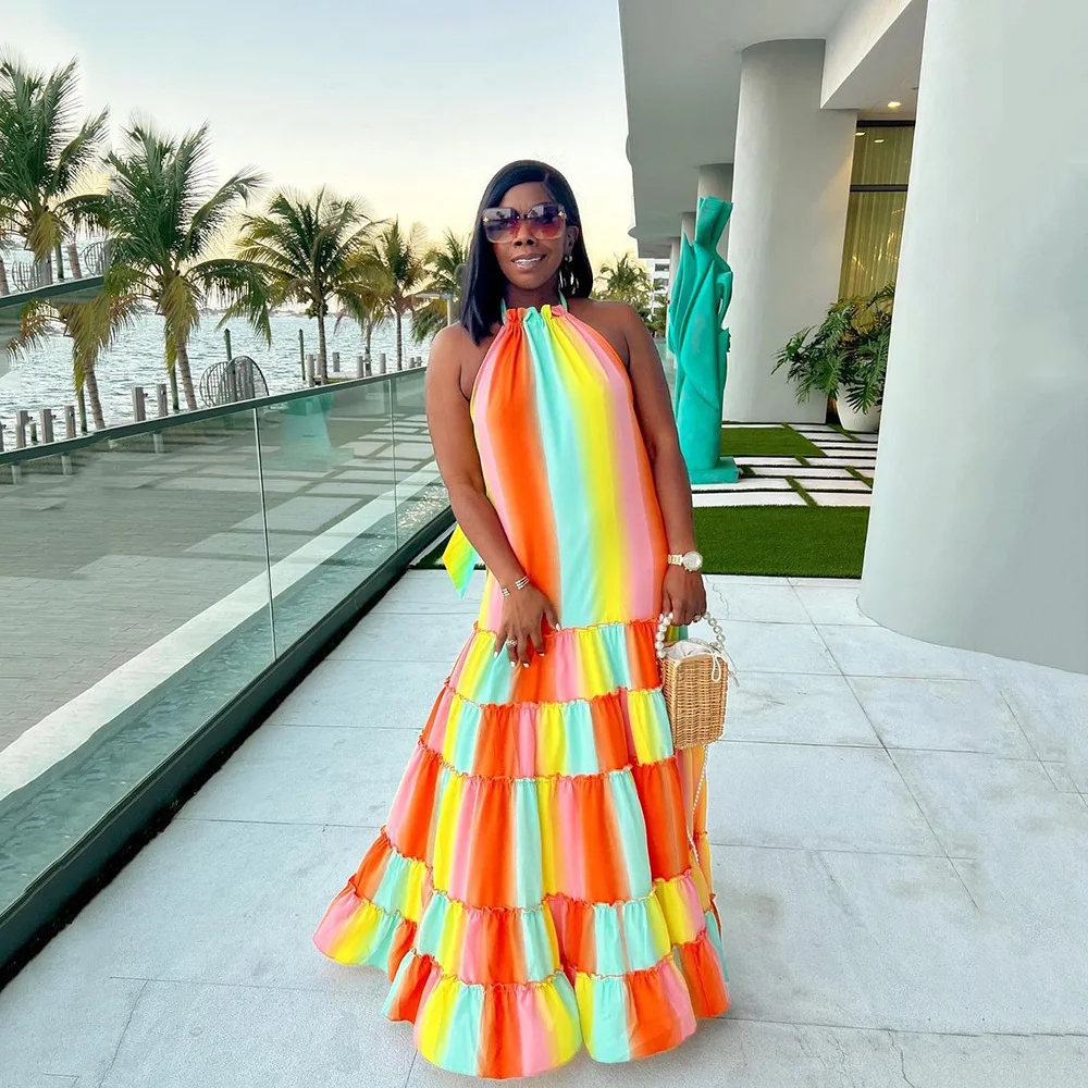 

2023 Winter New Women's Sleeveless Temperament Commuter Pullover Orange Halter Halter Print Loose Backless Swing Dress