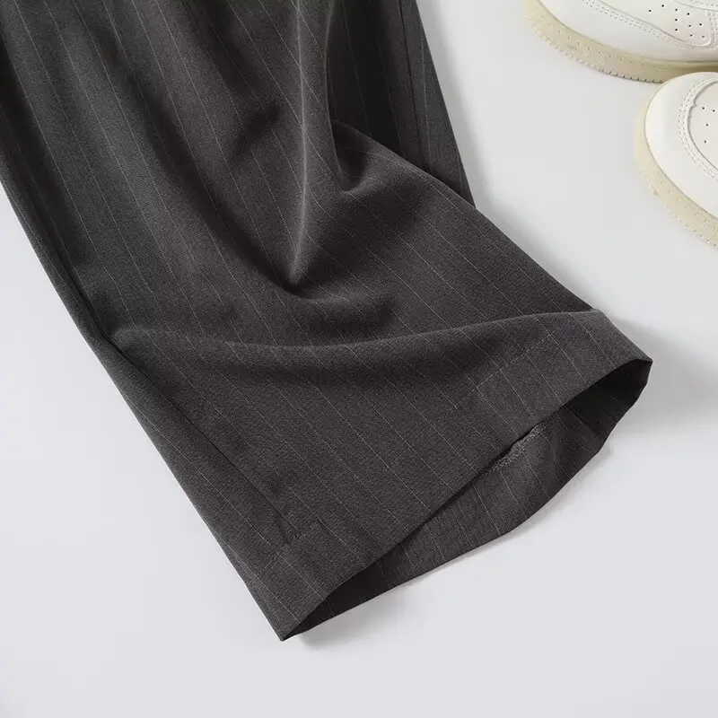 Брюки женские драпированные с завышенной талией на весну и осень