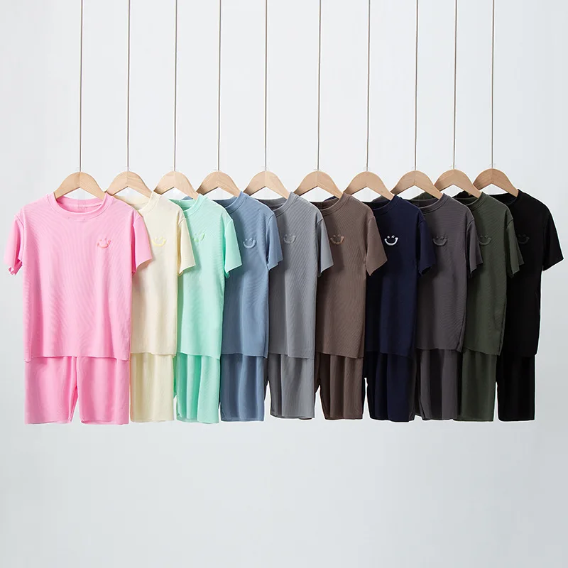 

2023 удобный летний Пижамный комплект для мальчиков и девочек из вискозы однотонная Свободная Домашняя одежда для детей среднего и старшего возраста