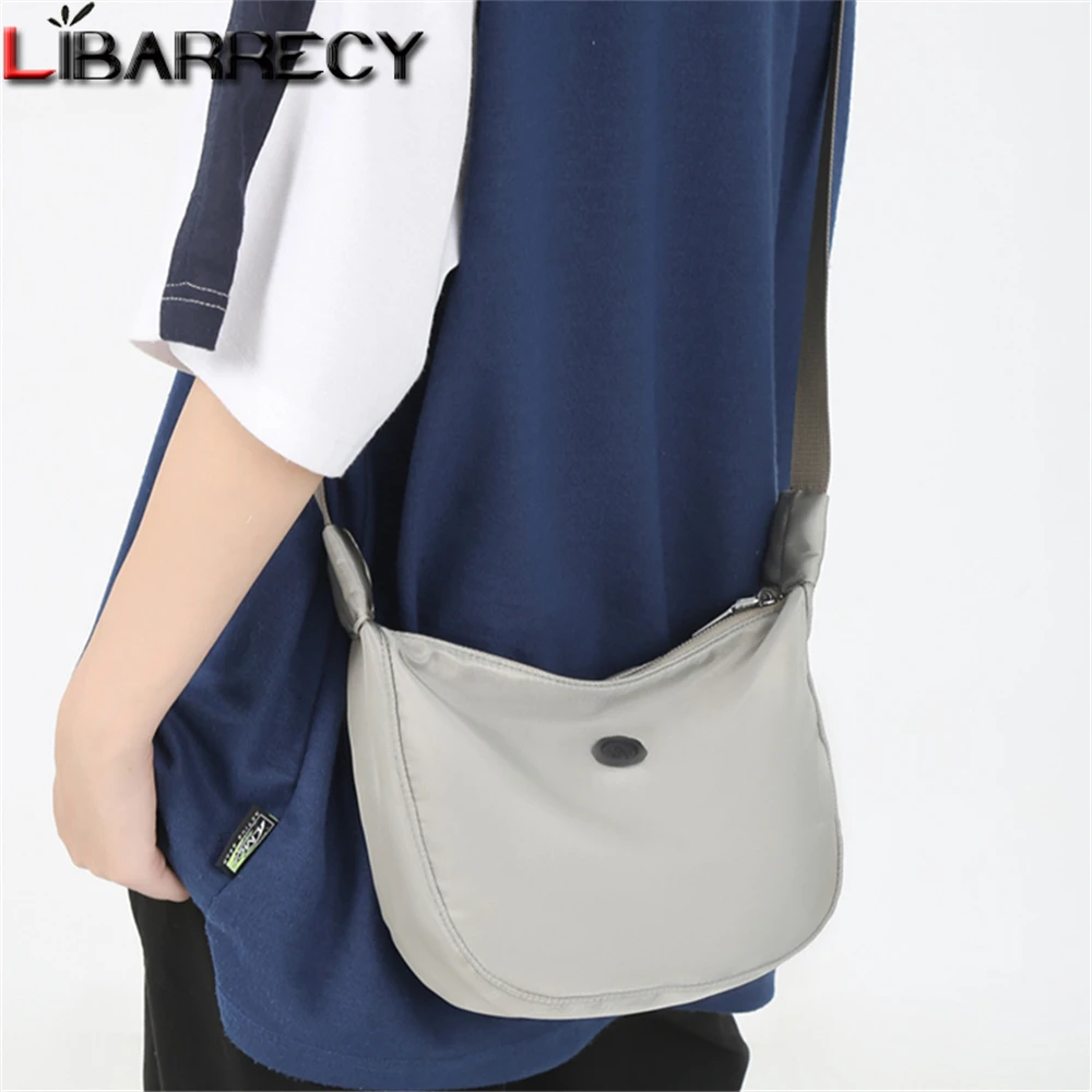 

Новинка 2022, однотонная женская сумка через плечо, модная Высококачественная нейлоновая женская сумка-мессенджер, маленькая Женская дорожн...