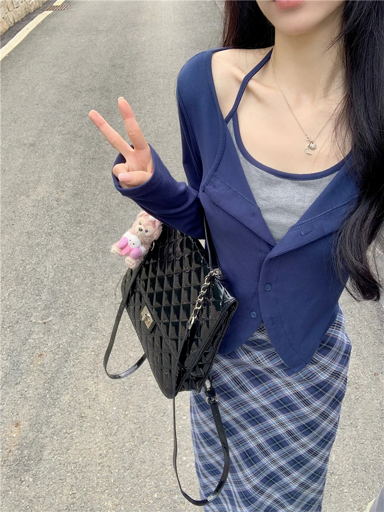 

GP4597 Pure Fake Two Piece Hanging Neck Long Sleeve Top Plaid Half Skirt Women's Autumn 2023 New Fashion Two Piece Set