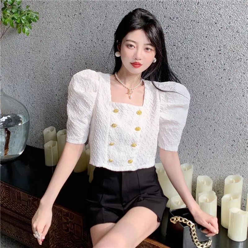 Make the net price of French small collar short jacket summer han edition female embossing hubble-bubble sleeve shirt double-bre |