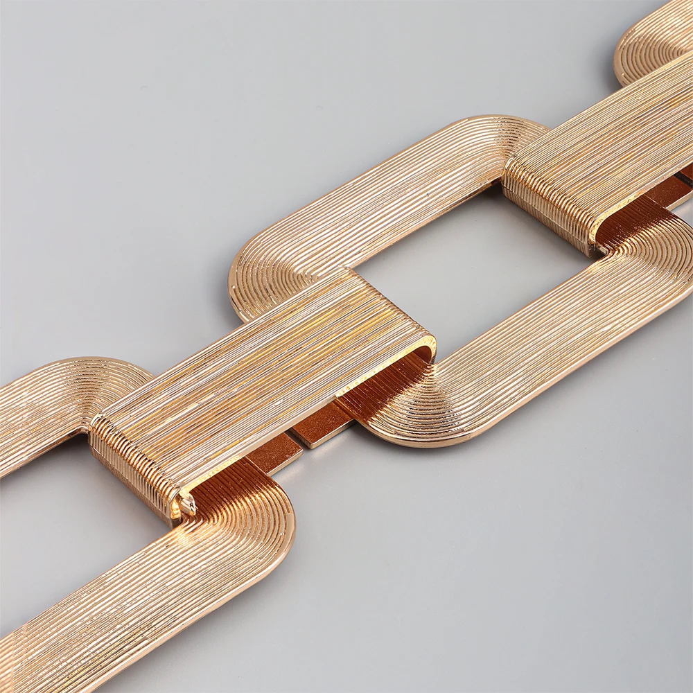 Женский эластичный пояс с металлической цепочкой