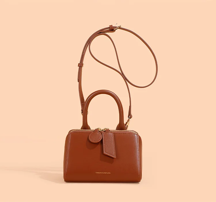 

Genuine leather women's bag crossbody bag summer high-end mobile phone bag commuting small bag design triangle bag handbag