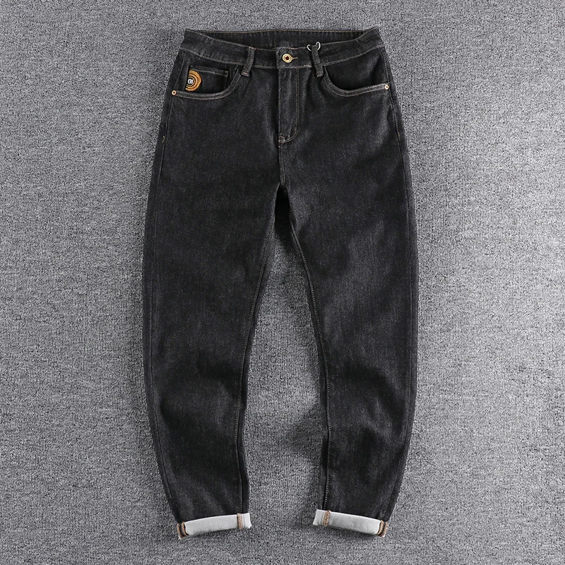 

2023 new arrival Embroidered autumn and winter thick jeans men's slim tapered youth pants 569