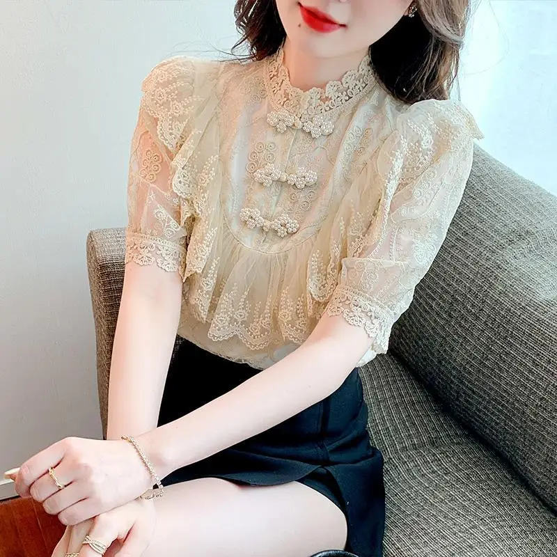 

Casual blouse female 2022 Summer installation thin embroidered lace shirt three -buckle mesh gauze lace shirt female blouse