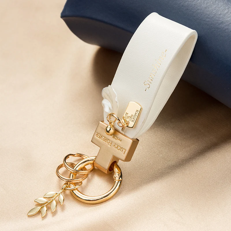

Fresh car keychain pendant creative personality online celebrity ins ladies exquisite hand rope car chain gifts