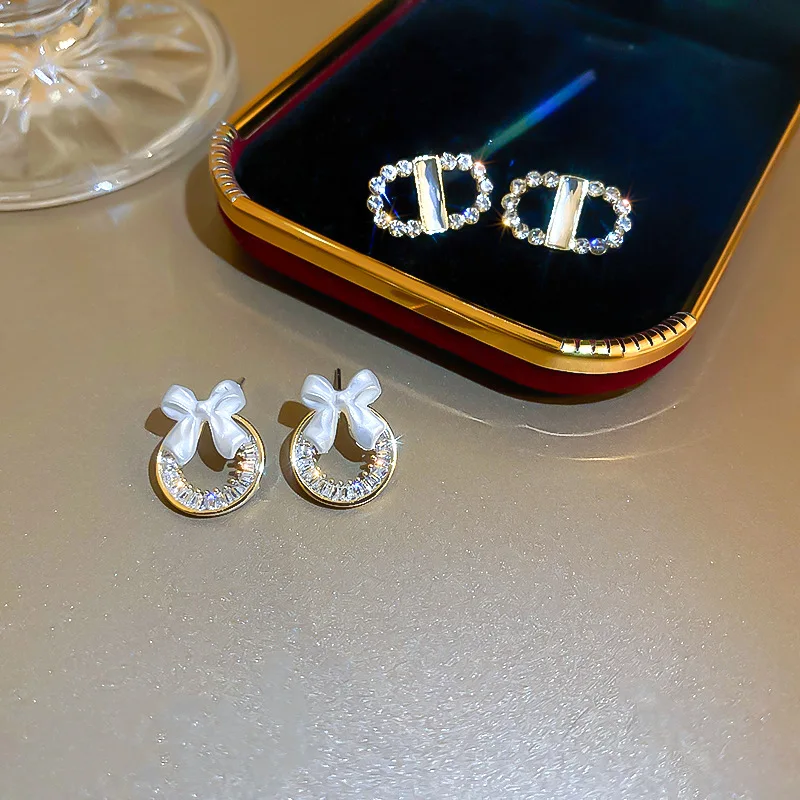 

New Korea Fashion Jewelry White Color Bowknot Cube Crystal Earring Round Bow Stud Earrings for Women Pretty Gifts 2022