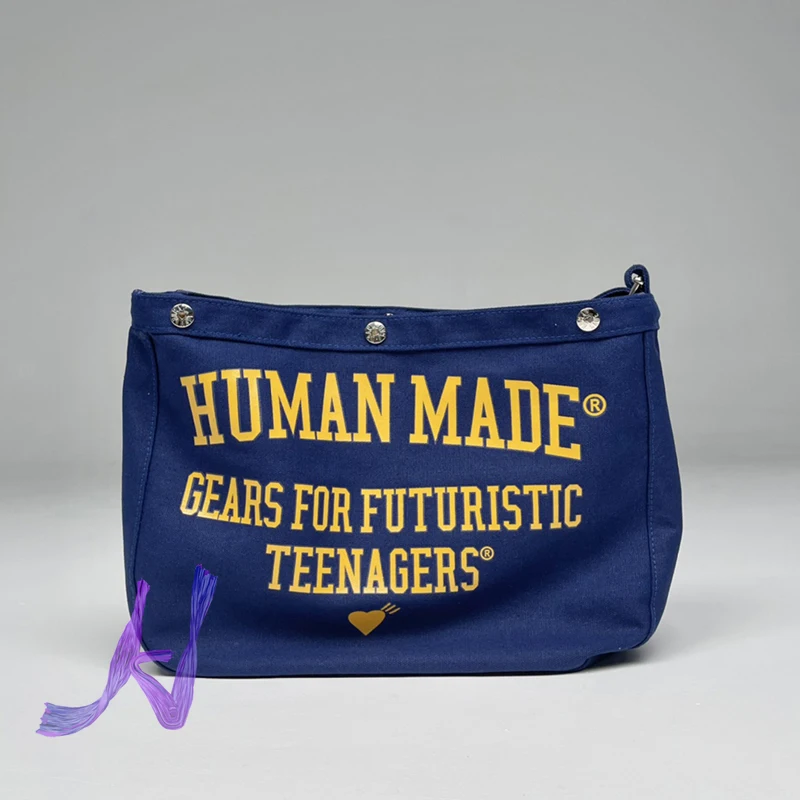 

Human Made Backpack High Quality Press Buckle Letter Printing Vintage Messenger Bag Human Made Fashion Couple Bag Canvas Bag