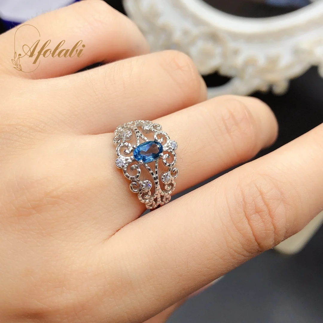 

Женское кольцо с голубым топазом, 4 Х6 мм