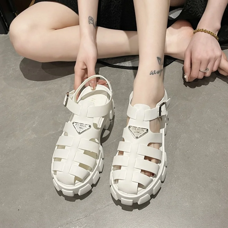 

2022 Spring and Summer New High-heeled Triangle Standard Thick-soled Roman Shoes Women's Hollow Baotou One-word Buckle Sandals