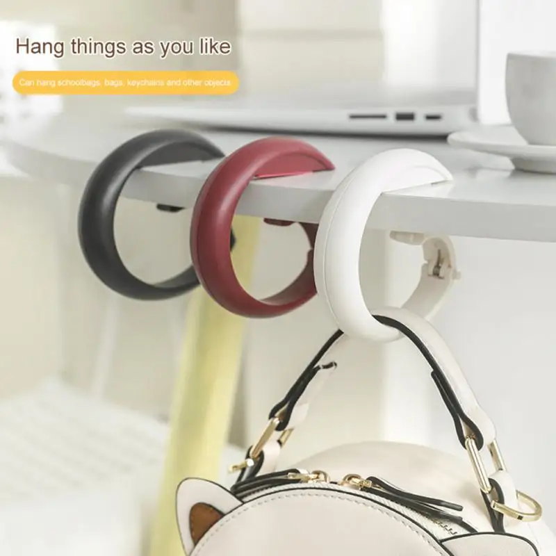 

2023 Multi-functional Handbag Organizer Creative Table Edge Hook Wholesale Punch-free Handbag Hanger New Portable For Student