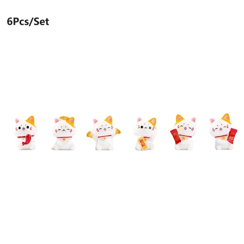 

Миниатюрные фигурки котов из канифоли