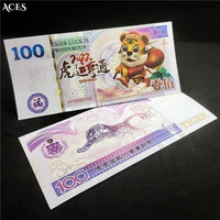 2022 tiger mascot paper money 100dollars lunar new year commemorative banknote anti counterfeiting fluorescent gold line version