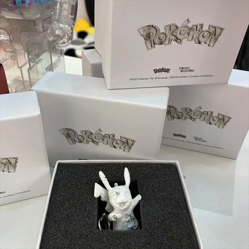 

Pokemon Anime Eroded Cute Pikachu White Doll Keychain Trend Jewelry Bag Clothing Pendant Car Keyring Children Toys Birthday Gift