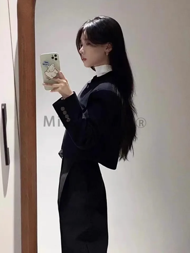 Женский брючный костюм с карманами