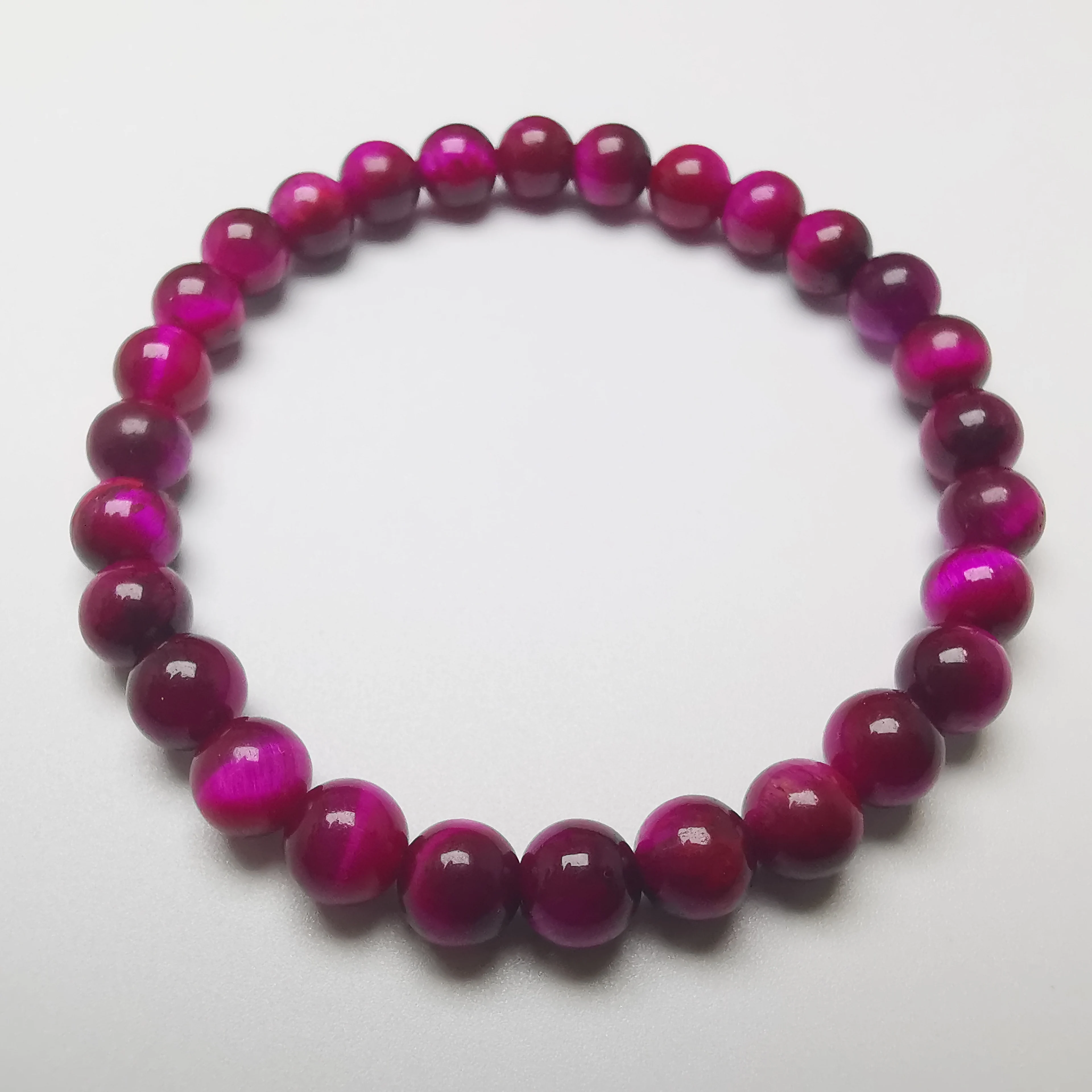 Розово-красный энергетический браслет Тигровый глаз