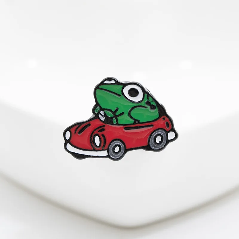 

Frog Driver Enamel Pin Small Red Car Brooch Backpack Clothes Lapel Funny Animal Frog Jewelry Gift for Friends Children