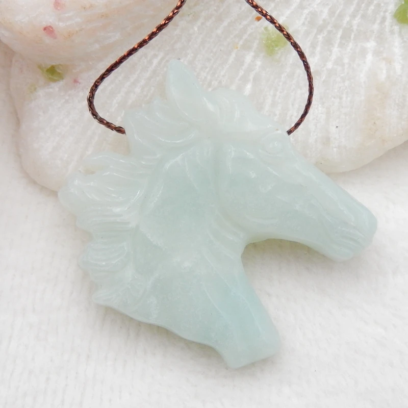 

Natural Carved Amazonite Horse Head Fashion pendant 43x40x8mm23g