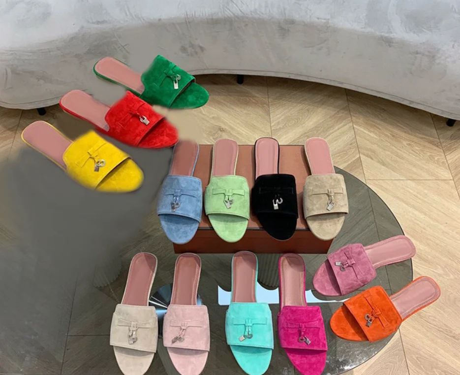 New high quality LP brand women's fashion flat slippers Sheepskin lock fringe casual outdoor slippers summer simple sandals.