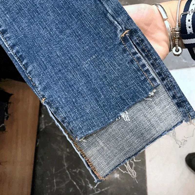 Ripped jeans denim knee hole women new Korean high waist slim slim nine points pencil pencil pants tide