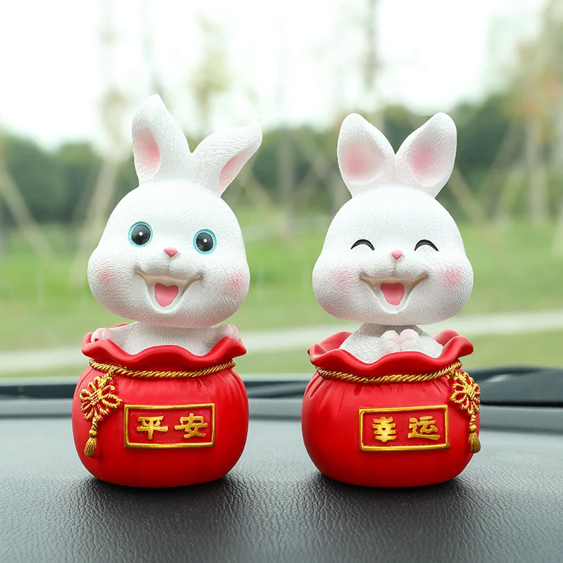 

Cute Rabbit Car Ornament Swing Head 2023 Chinese Zodiac New Year Lucky Figurines Creative Gift Car Interior Decor