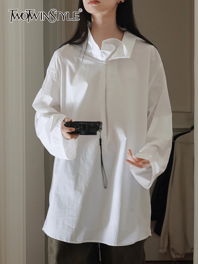 

TWOTWINSTYLE Irregular Minimalist Shirt For Women Stand Collar Long Sleeve Patchwork Single Button Elegant Blouse Female Clothes