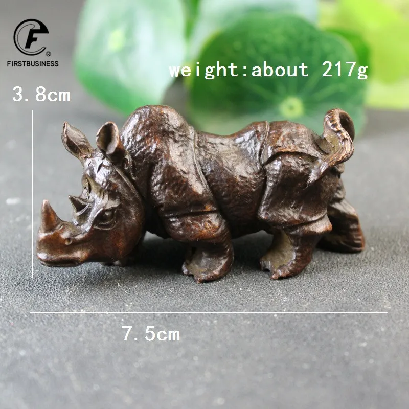 

Медные фигурки носорогов