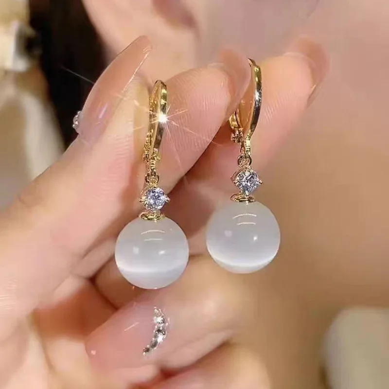 Индивидуальные простые женские серьги-подвески в виде кошачьего глаза с