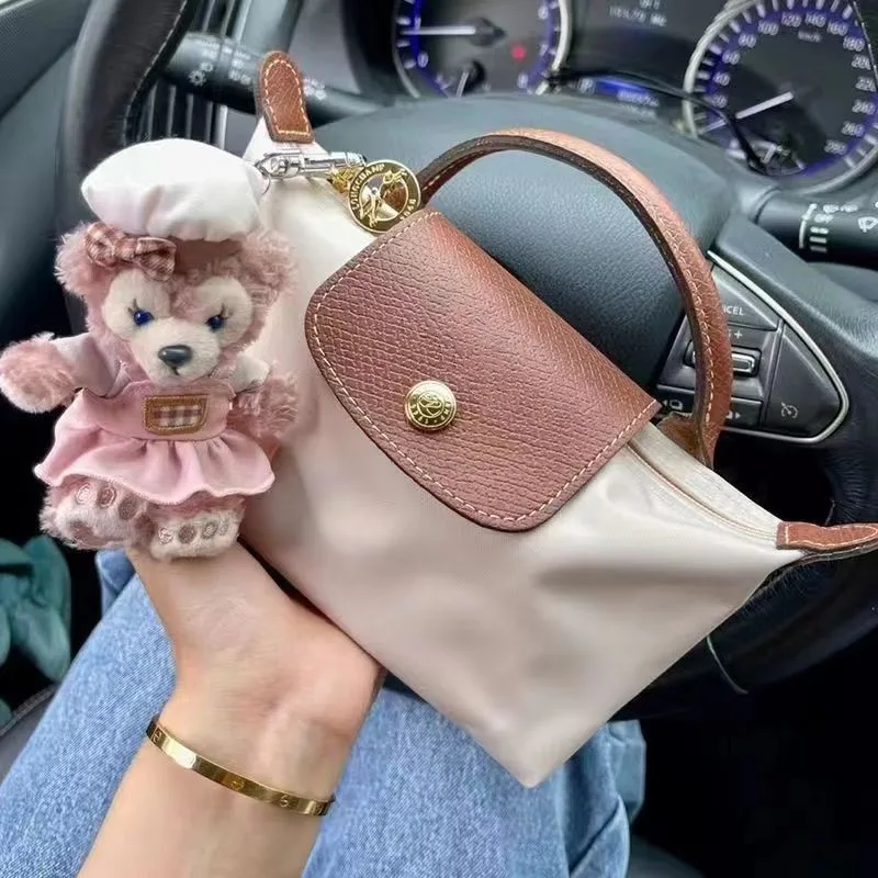 

Mini Dumpling Bun Fashionable and Versatile One Shoulder Crossbody Handheld Women's Bag with Large Capacity New Longxiang Dumpli