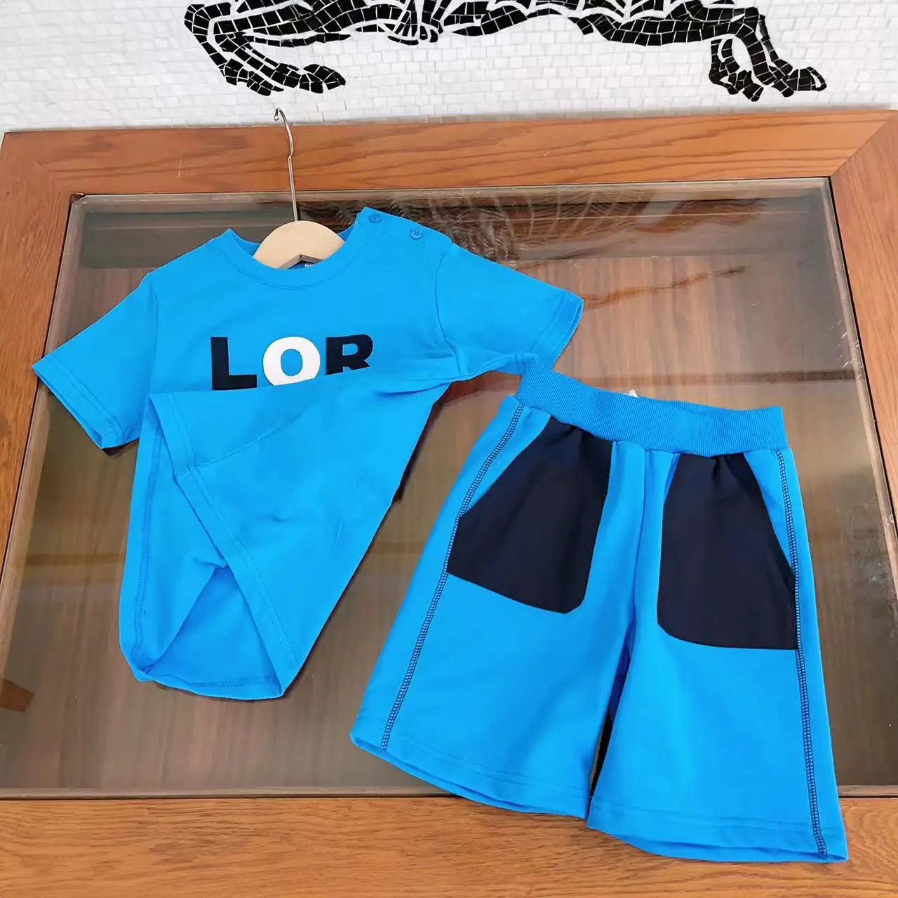 

Popular children's clothing 2023 fashionable spring and summer new products for boys and girls The same casual letter casual com