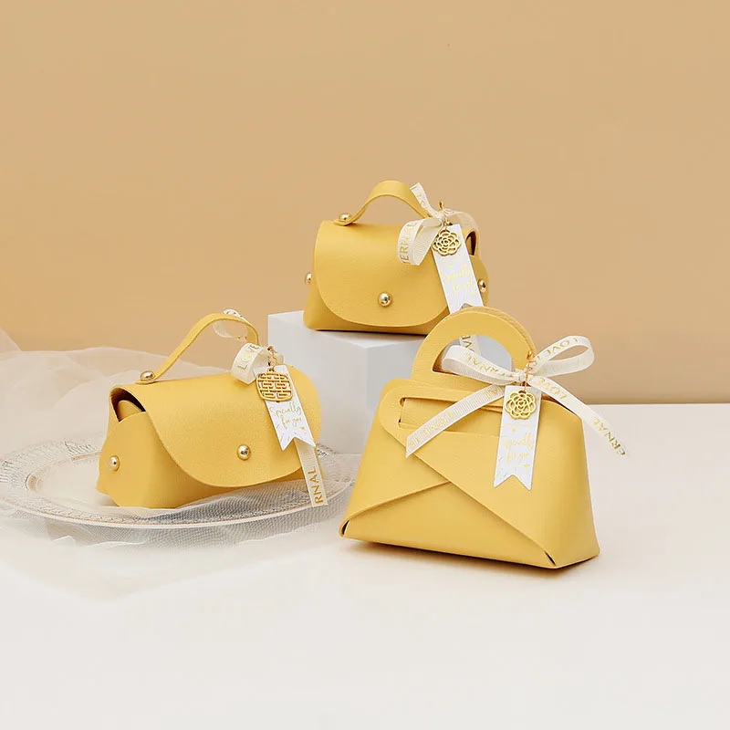 Leather Gift Box Handbag Shape Ribbon Bow with Hand Candy Bag Packaging Wedding Favors Baby Shower Party Supply |