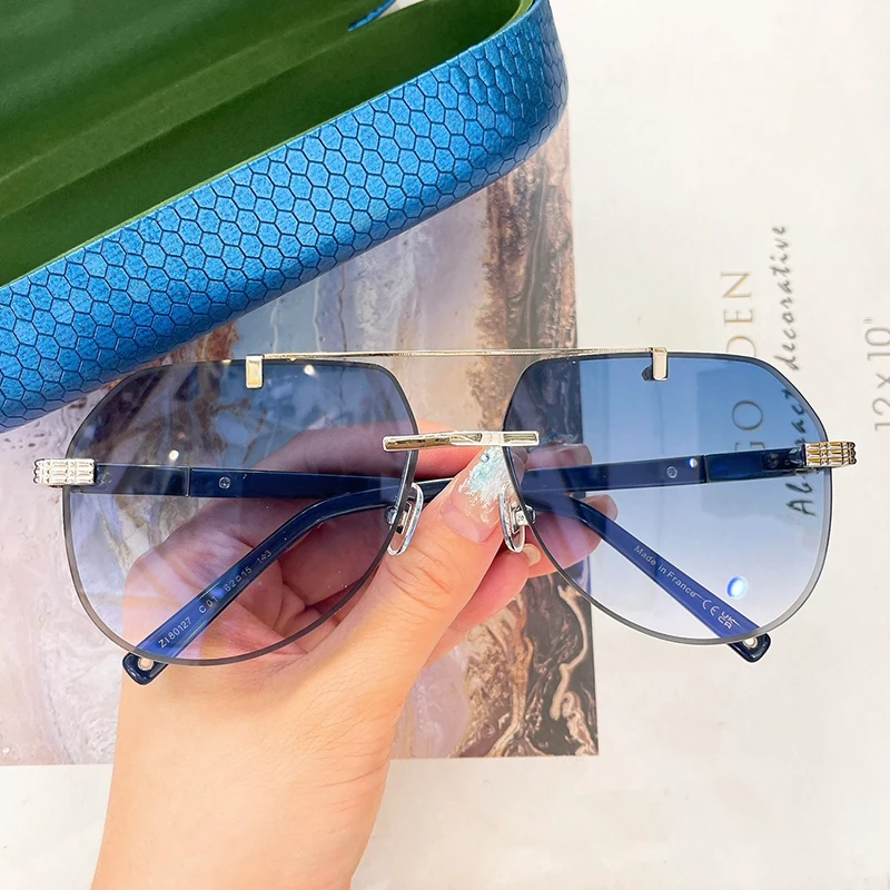 ZI80127 Овальные модные солнцезащитные очки без оправы из титана и ацетата с