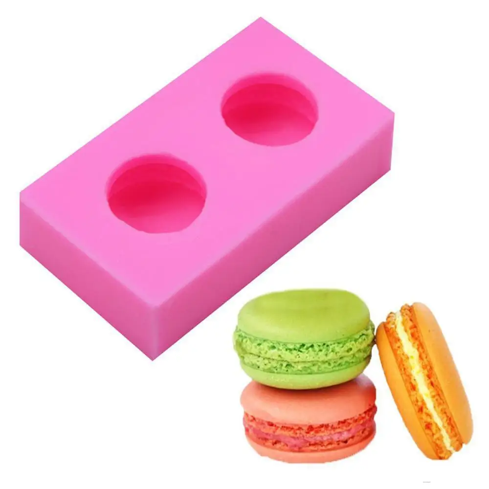 

Macaron shapes a silicone mold for a chocolate mousse cake with sugar and cream