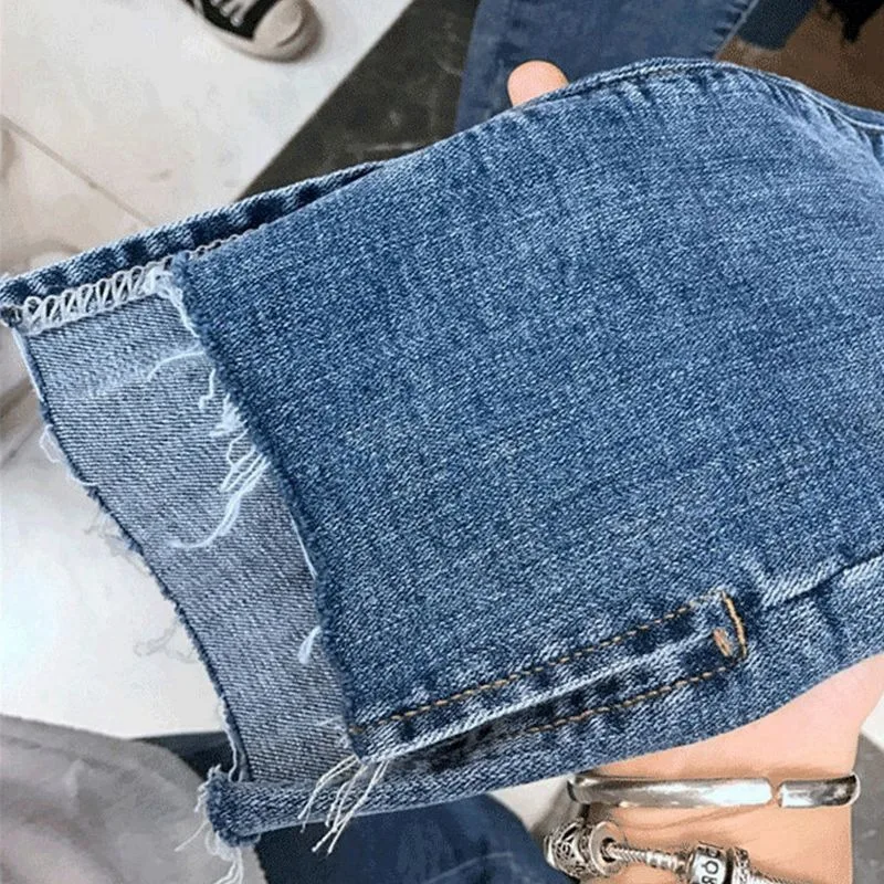 Ripped jeans denim knee hole women new Korean high waist slim slim nine points pencil pencil pants tide