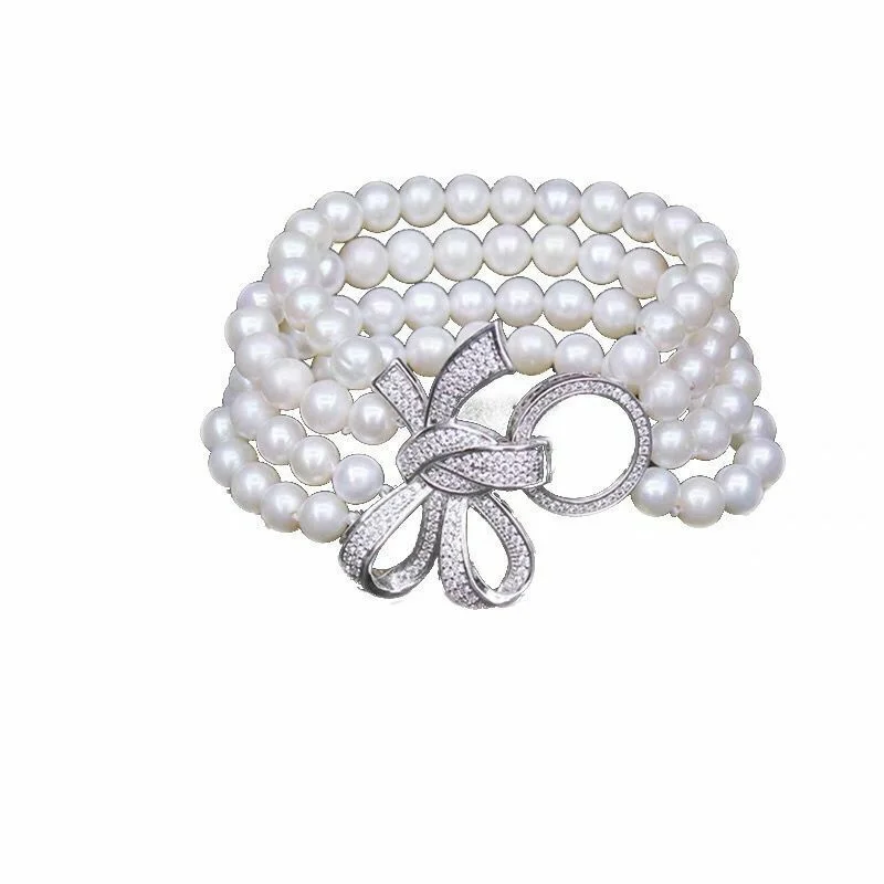 

Браслет из четырех нитей 5-6 мм с белым жемчугом ЮЖНОГО МОРЯ 7,5-8 дюймов