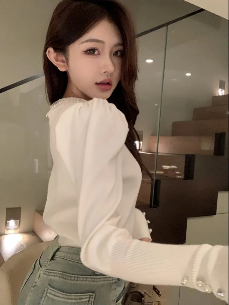 Футболки женские с длинными пышными рукавами и круглым вырезом облегающие