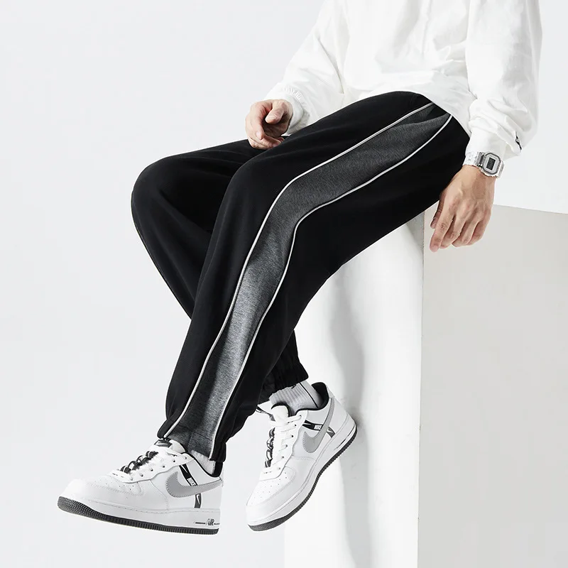 

FOR Men's sports pants spring and autumn new loose straight large size drawstring striking pants Korean version of the zipper