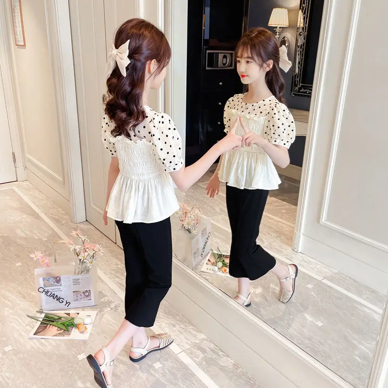 

Детские летние модные длинные брюки-клеш для девочек, наряды, топы в горошек с коротким рукавом, детская одежда, корейский Повседневный комплект из двух предметов Z29