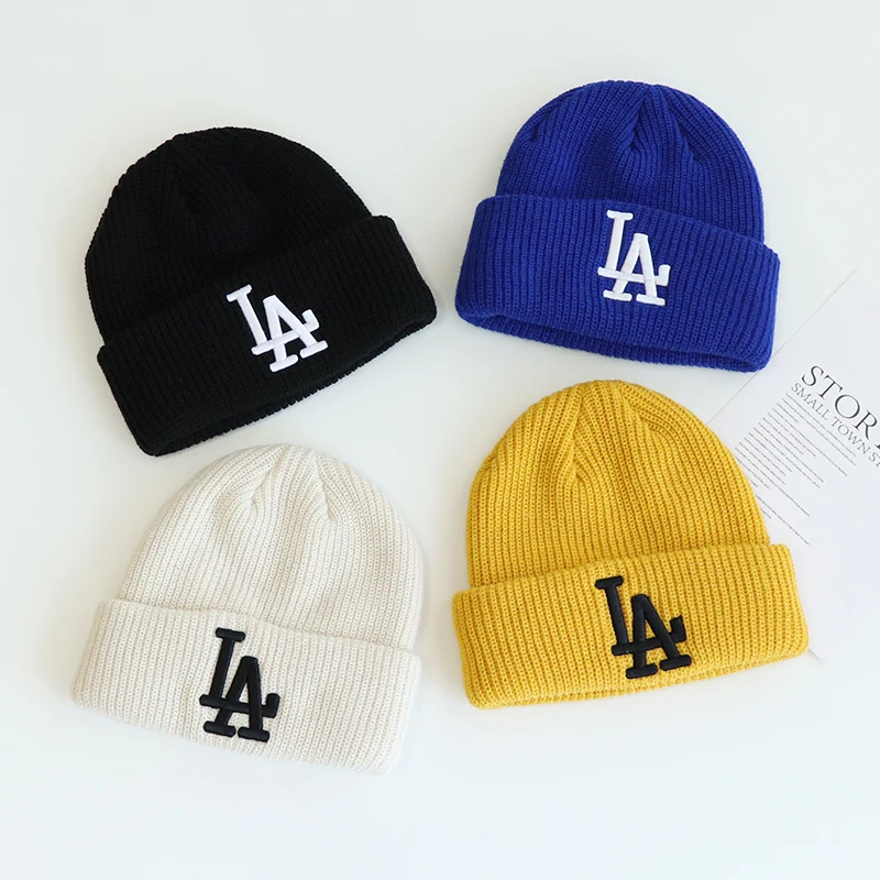 

Autumn and winter children's hats boys' pullovers thickened hats girls' knitted and embroidered warm wool moist hats Baby hats