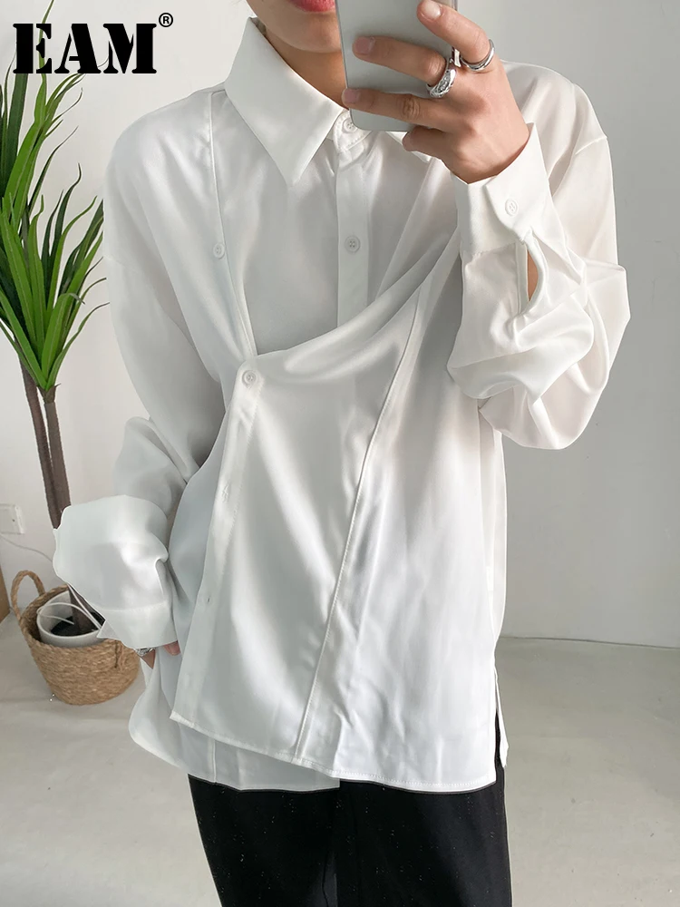 

[EAM] Women White Button Irregular Big Size Blouse New Lapel Long Sleeve Loose Fit Shirt Fashion Tide Spring Autumn 2023 1DF0377
