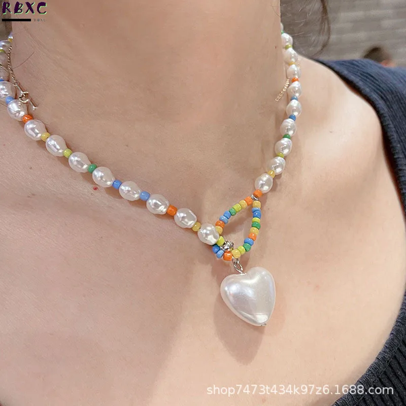 

Korean Version 2022 New Shaped Baroque Pearl Necklace Women's Versatile Love Pendant Niche Design Sense Collarbone Chain