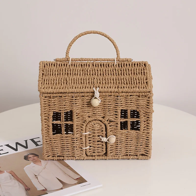 

Cartoon small house hand-held straw bag new niche design hut hand-held woven bag to go out to store the basket