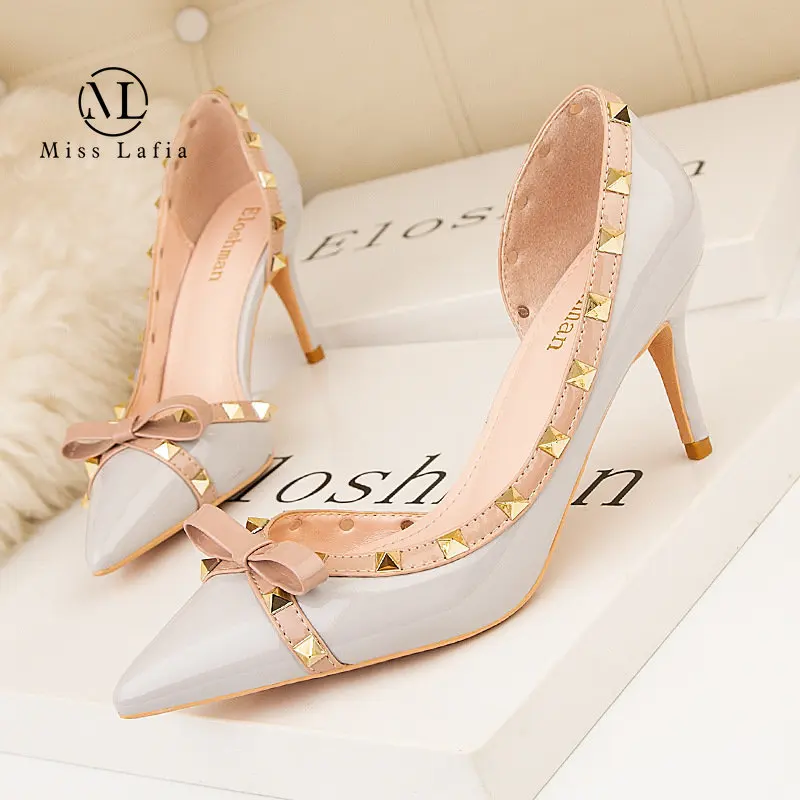 

2023 New Style Europe America Sexy Nightclub Woman Shoes Heels High Heels Shallow Mouth Side Hollow Rivet Shoes