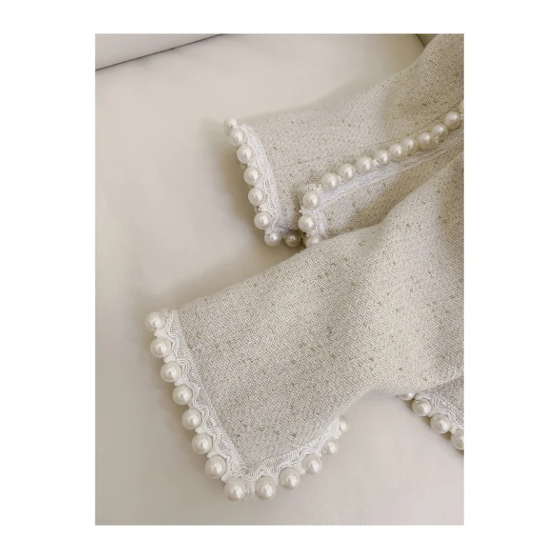 Рисунок 6 - Женское твидовое короткое пальто