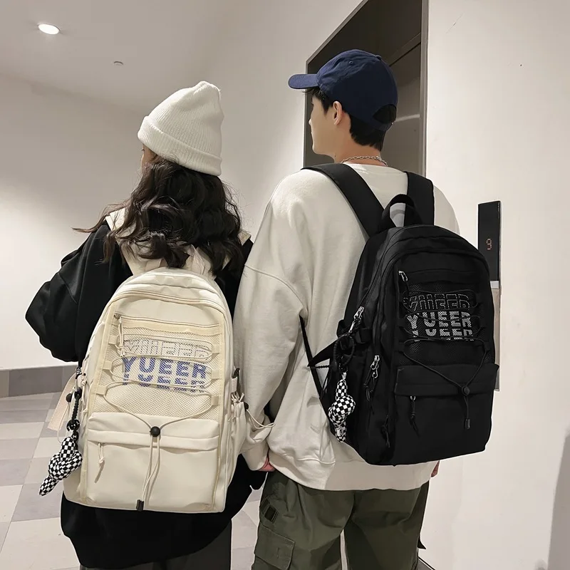 

2022 spring new Japanese simple backpack female Harajuku style alphabet college wind college student trend backpack
