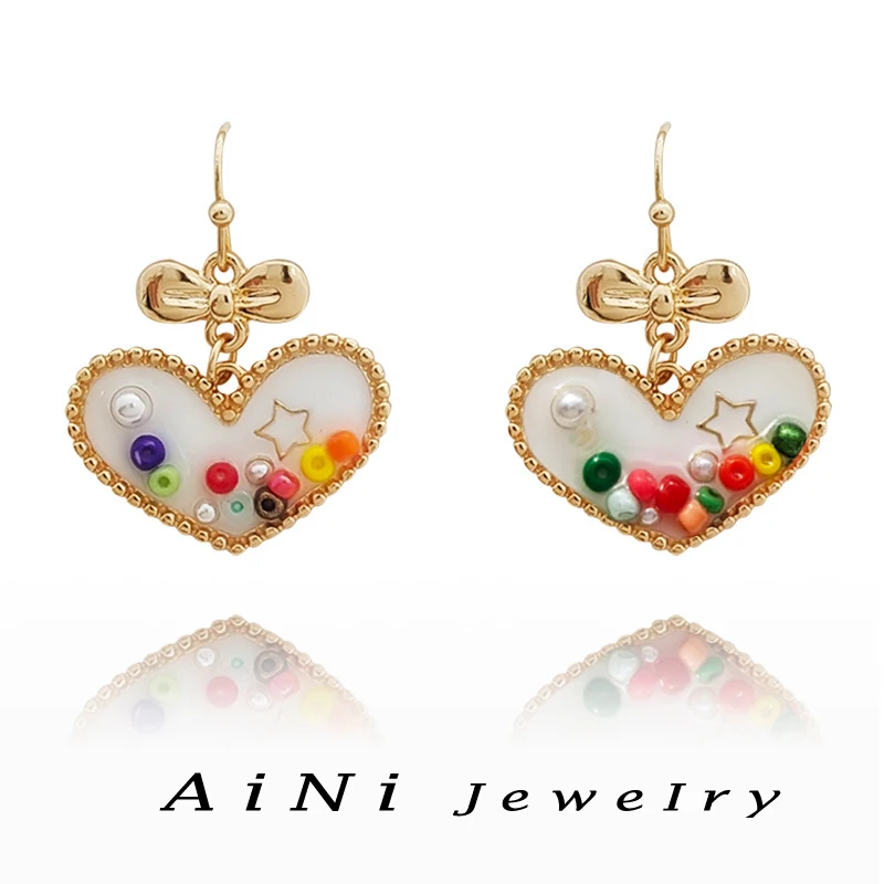

Fashion Jewlery Colorful Heart Earrings Sweet Korean Temperament Hot Sale Gole Color Bowknot Drop Earrings For Women Girl Gift