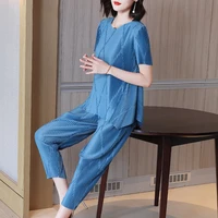 pant suits for women elastic loose miyake pleated 2022 summer new round neck short sleeve top pants two piece set